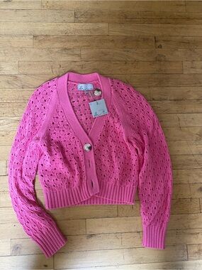 Dh pink sweater. Gorgeous!! New with tags!!! Size medium.